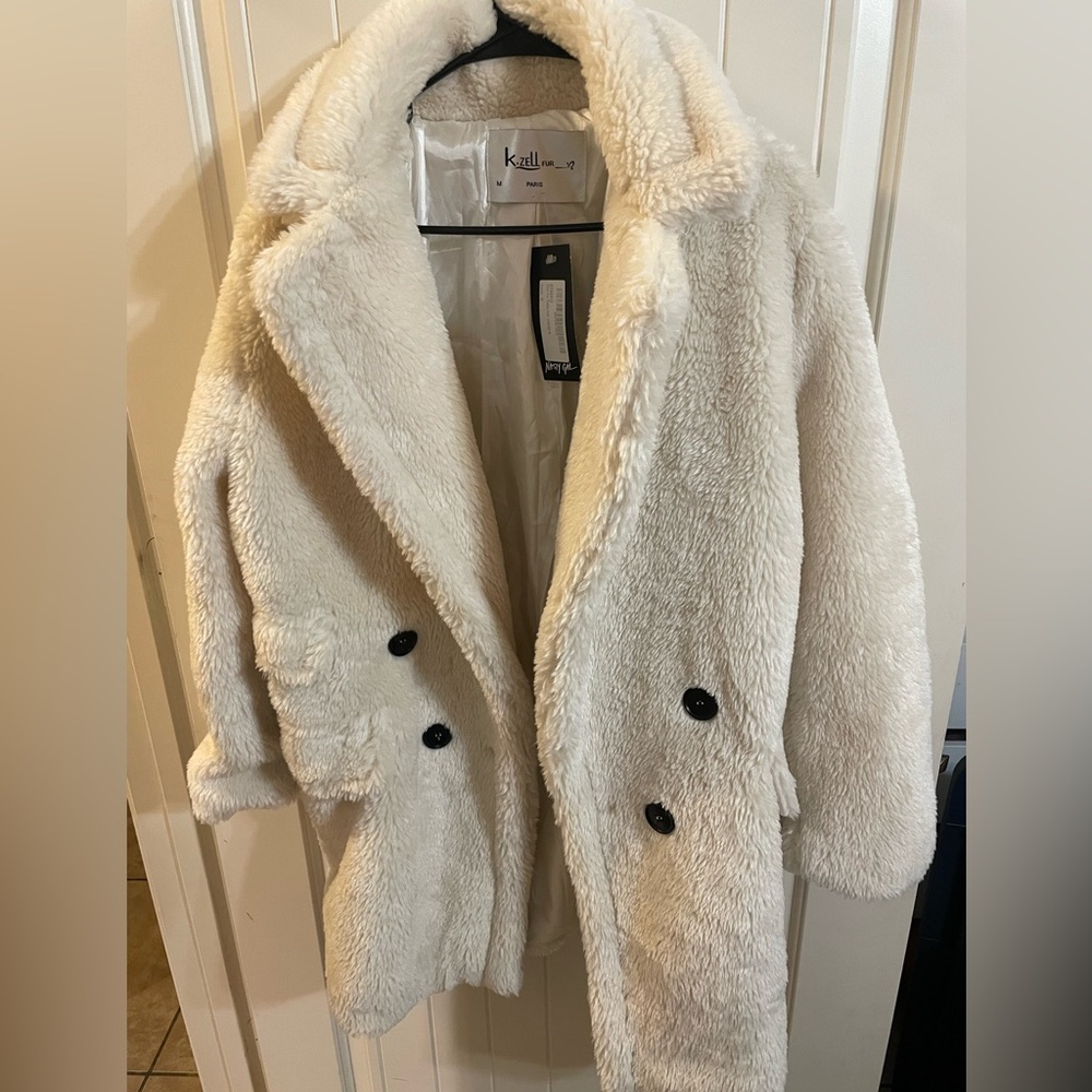 Cream Teddy coat purchased from Nasty Gal